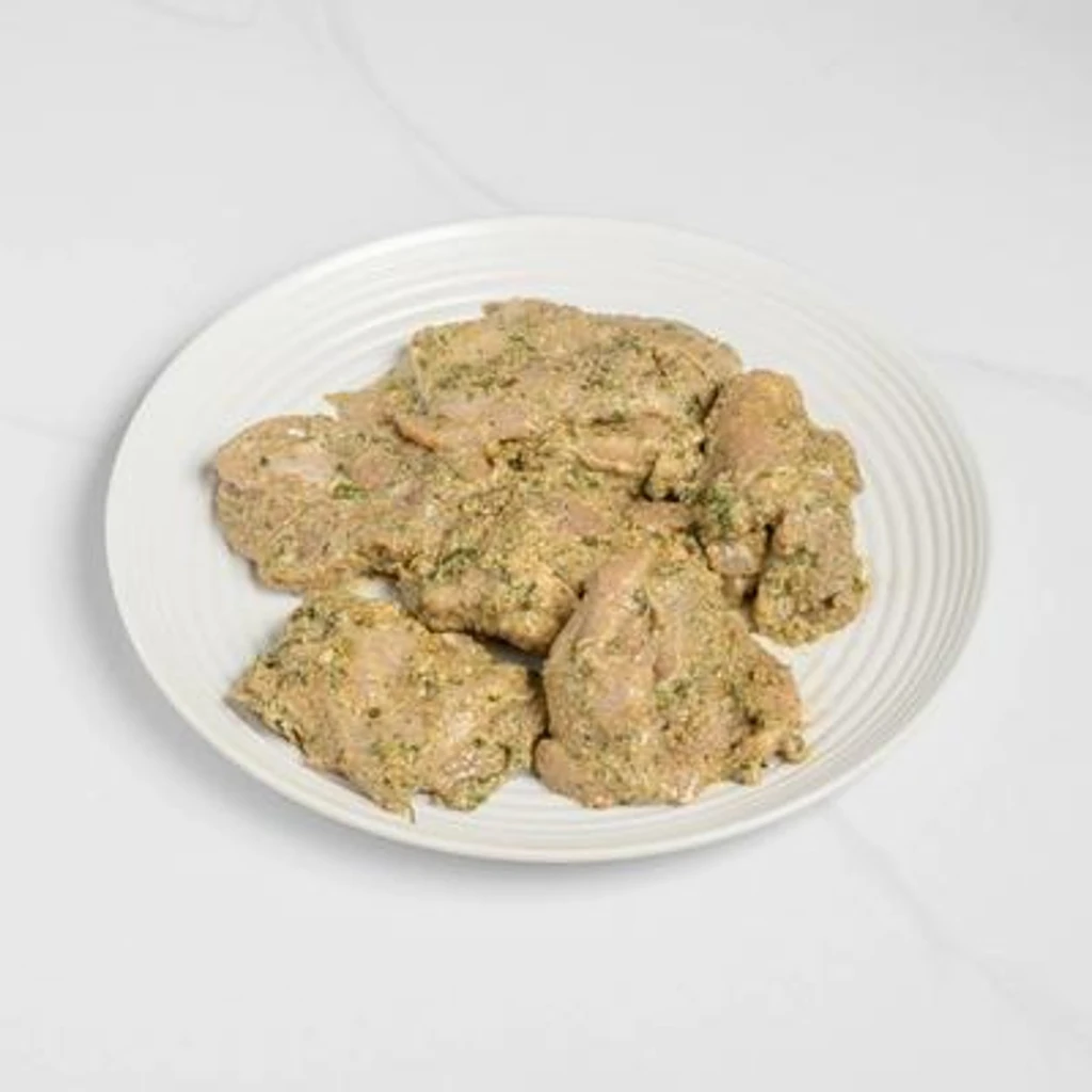 Chicken Malai Tikka grilled boneless chicken thigh at Flames & Grills By Tuli's, grill and tandoor restaurant in Calgary NW
